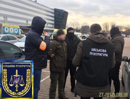 Офіцера Нацгвардії затримали під час одержання хабара у 1000 доларів